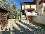Villetta a schiera angolare con garage e giardino
